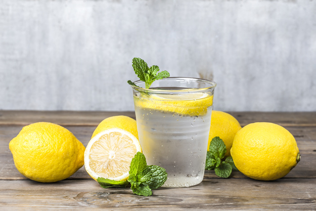 Homemade lemonade with fresh lemon and mint